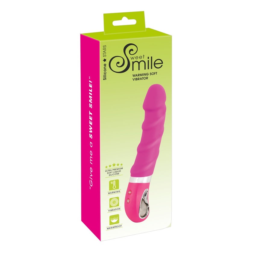 vibe sexspielzeug Junge glückliche sexy Frau, die Sexspielzeug in der Hand hält, masturbiert  mit Vibrator im Bett im Schlafzimmer zu Hause